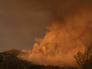 Smoke from the Airport Fire fills the skies Monday, Sept. 9, 2024, near Trabuco Canyon, Calif.