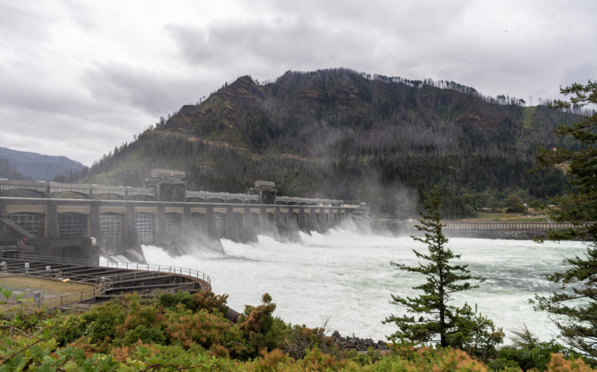 The Columbia River pours through the Bonneville Dam spillway in August. A new study from the U.S. Department of Energy&rsquo;s Richland-based Pacific Northwest National Laboratory indicates climate change may increase hydropower generation.