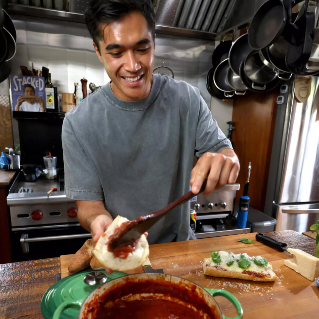 Food content creator Owen Han, known as the &ldquo;Sandwich King,&rdquo; makes a meatball sandwich Aug. 28 in his studio kitchen in Venice, Calif.