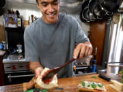 Food content creator Owen Han, known as the &ldquo;Sandwich King,&rdquo; makes a meatball sandwich Aug. 28 in his studio kitchen in Venice, Calif.