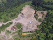 An aerial view of the Washougal quarry near the Columbia River Gorge National Scenic Area. The county has received 22 applications for surface mining zoning, which would significantly expand the county&rsquo;s mining operations, similar to the Washougal quarry, if approved.