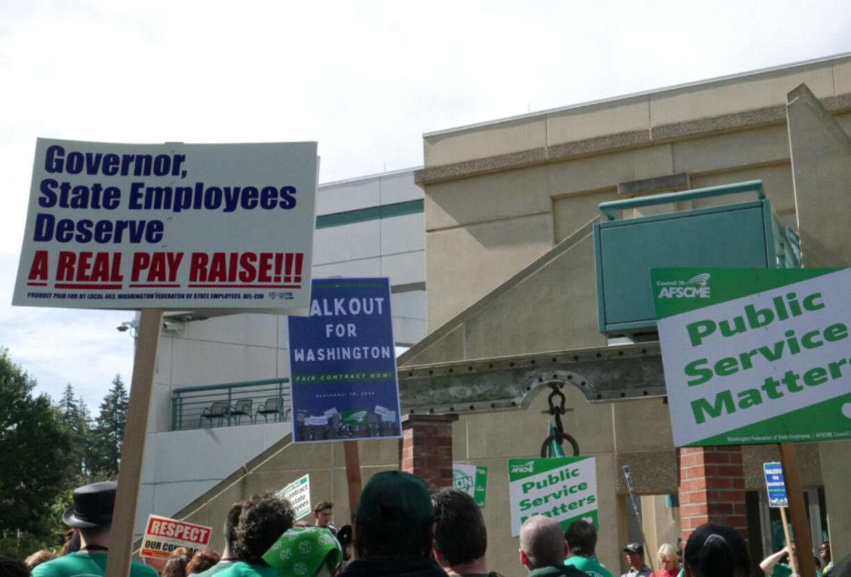 State employees gathered outside the Labor and Industries Building in Tumwater Sept. 10 as part of a statewide walkout to demand fair wages and safe staffing levels.