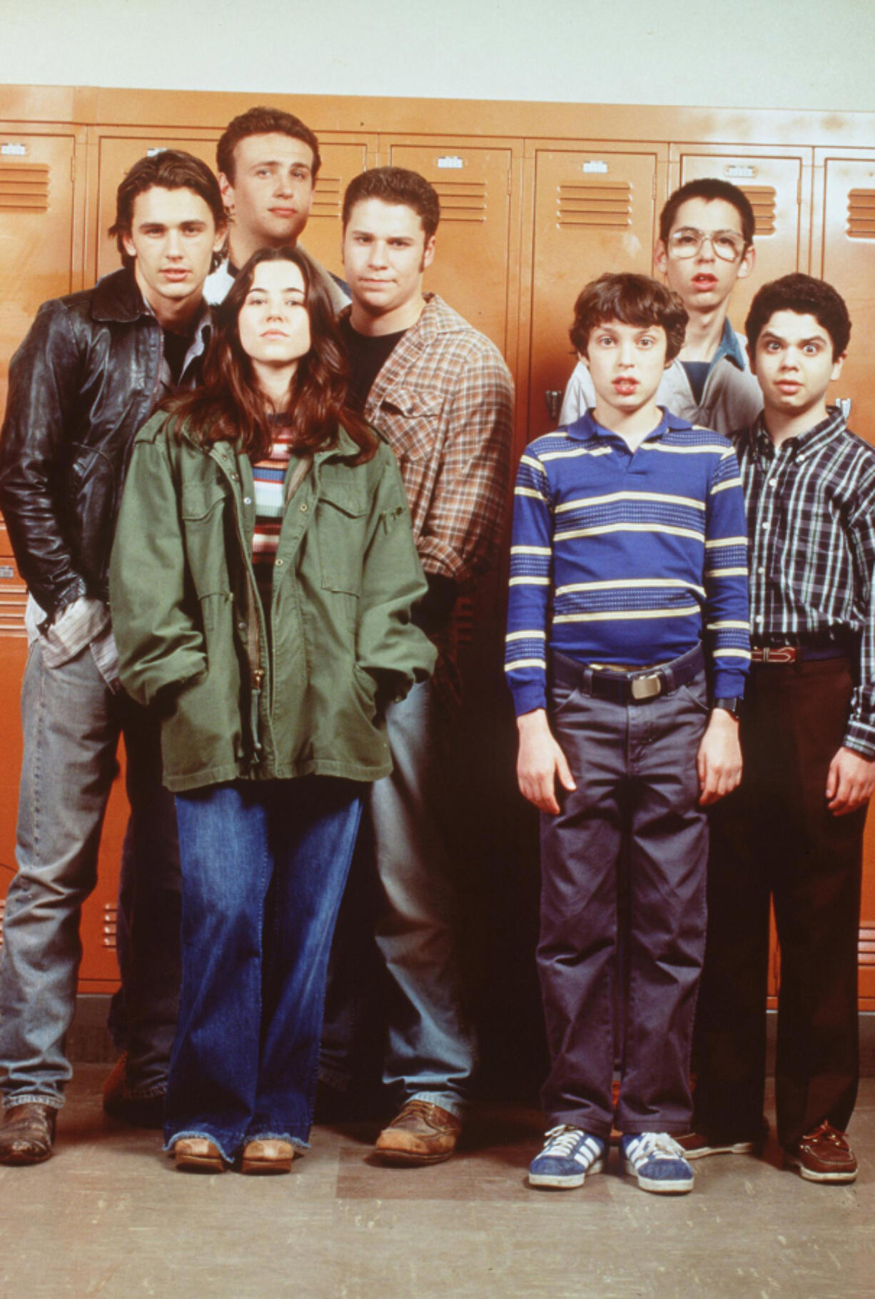 The cast of &ldquo;Freaks and Geeks.&rdquo; From left: James Franco (as Daniel), Jason Segel (as Nick, back), Linda Cardellini (as Lindsay Weir, front, green jacket), Seth Rogen (as Ken Miller, plaid shirt), John Daley (as Sam Weir, front blue striped shirt), Martin Starr (as Bill Havenchuck, back wearing glasses) and Samm Levine (as Neal, far right).