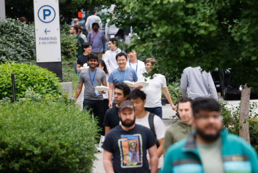 Sidewalks fill with pedestrians during lunch hour in South Lake Union in Seattle on Aug. 21, 2024. Various return-to-office mandates by Amazon and others last year are bringing more people into the area.