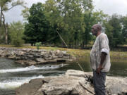 Michael Gilbert, 64, was fishing in Springfield on a recent afternoon. He said he wasn&rsquo;t worried about the safety of his puppy, Sissy.