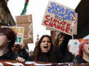 Climate protesters march through the city centre  on Oct. 28, 2022, in Glasgow, Scotland. The march was timed to mark the anniversary of the COP26 climate summit, held in Glasgow last year. The protesters called the COP a failure and accused the UK government of &ldquo;greenwashing&rdquo; links between fossil fuels and the current cost-of-living crisis.