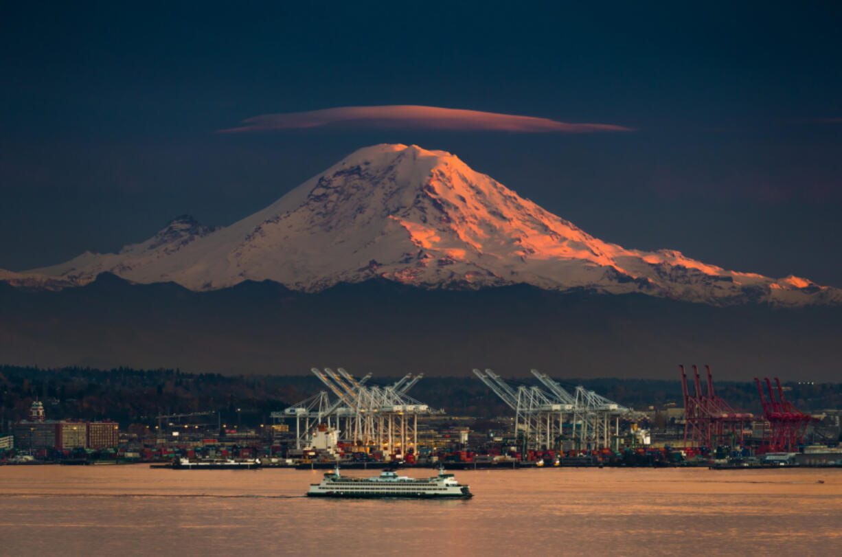 Lenticular cloud caps Mount Rainier as seen from West Seattle.