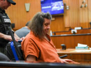 A corrections officer pushes Kenneth Jay Moore, 53, into a courtroom for a hearing Aug. 23 in Clark County Superior Court. Moore was resentenced Wednesday to 33 years in prison for the 2017 killing of his mother at their Vancouver home. He was originally sentenced to 34 years in prison, but the Washington Court of Appeals found factors that a judge considered when he ordered the sentence were not properly proven to the jury that convicted him.