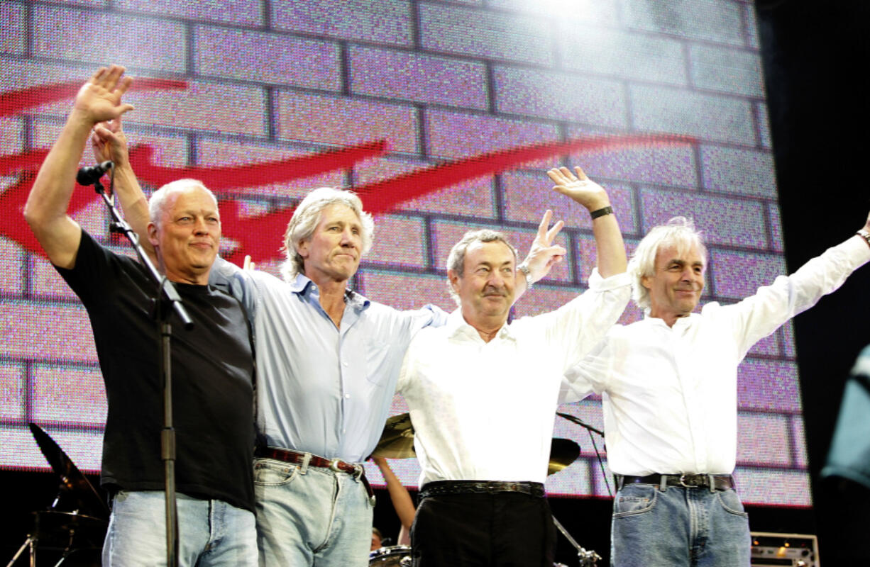 From left, David Gilmour, Roger Waters, Nick Mason and Rick Wright of Pink Floyd onstage at the Live 8 concert in Hyde Park on July 2, 2005, in London.