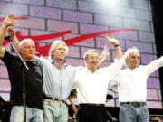 From left, David Gilmour, Roger Waters, Nick Mason and Rick Wright of Pink Floyd onstage at the Live 8 concert in Hyde Park on July 2, 2005, in London.