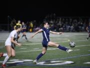 Skyview's Dea Covarrubias, center, flicks the ball forward in front of Camas defender Natalie Boyle, left, during a 4A Greater St. Helens League girls soccer game on Wednesday, Oct. 9, 2024, at Skyview High School.