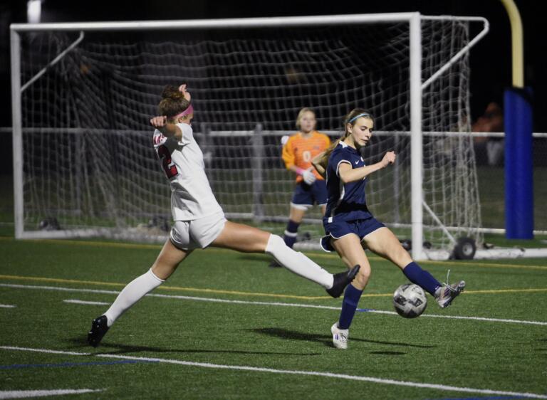 Skyview's Makenna Flinn, right, clears the ball away from Camas' Saige McCusker during a 4A GSHL girls soccer game on Wednesday, Oct. 9, 2024, at Skyview High School.