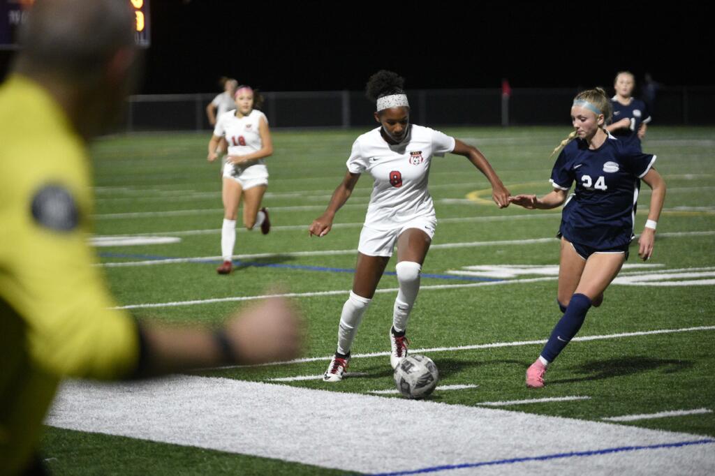 Camas' Kaliyah Salley (8) dribbles up the field against Skyview's Lauryn Cornelius (24) during a 4A GSHL girls soccer game on Wednesday, Oct. 9, 2024, at Skyview High School.