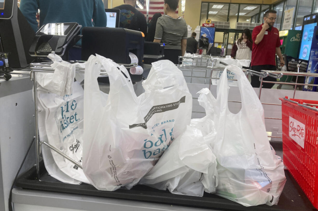 Single-use plastic bags are in use at a ShopRite grocery store in Lyndhurst, New Jersey, on Tuesday, May 3, 2022. A state law that goes into effect this week bans the use of the bags due to environmental concerns.