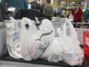 Single-use plastic bags are in use at a ShopRite grocery store in Lyndhurst, New Jersey, on Tuesday, May 3, 2022. A state law that goes into effect this week bans the use of the bags due to environmental concerns.