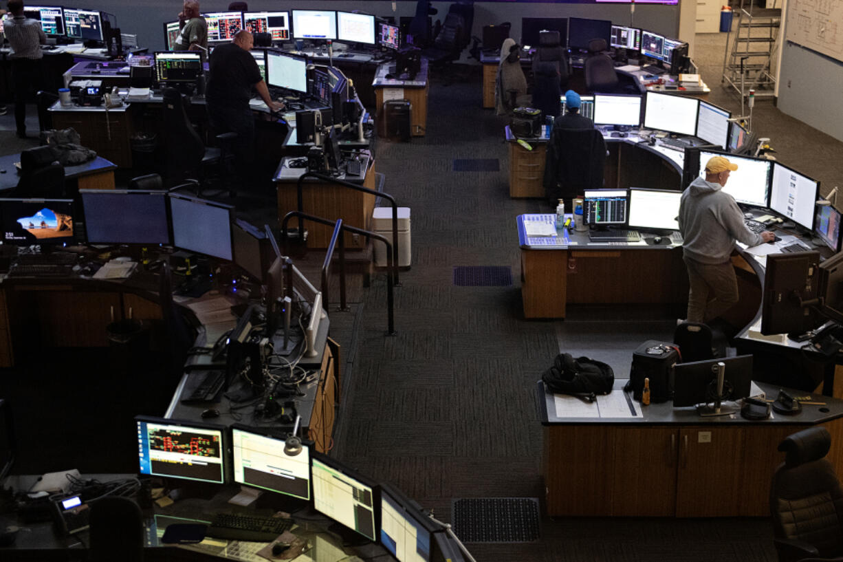 System dispatchers monitor the grid at the Bonneville Power Administration&rsquo;s Ross Complex. Growing demand for power in the region and state mandates requiring carbon-free energy in the future complicate the administration&rsquo;s work. The administration can&rsquo;t guarantee a carbon-free product. Utilities across the region may need to find their own energy sources in the future to make up the difference.