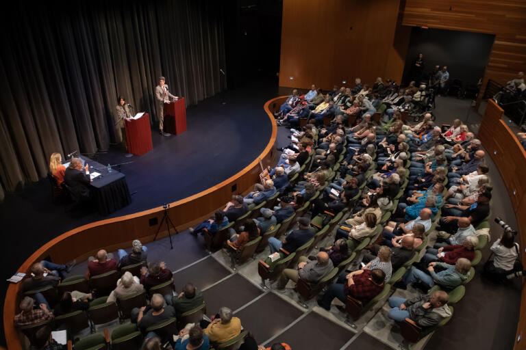 U.S. Rep. Marie Gluesenkamp Perez, at left podium, takes center stage with challenger Joe Kent during a contentious debate at Lower Columbia College on Wednesday evening, Oct. 2, 2024.