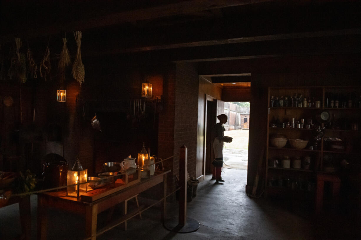 Volunteer Madison Glenn lends a hand in the kitchen at Fort Vancouver National Historic Site.