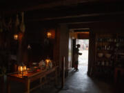 Volunteer Madison Glenn lends a hand in the kitchen at Fort Vancouver National Historic Site.