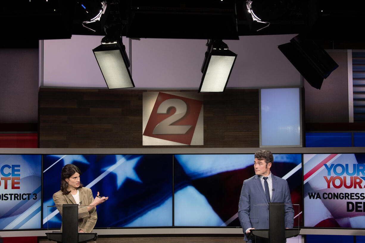 U.S. Rep. Marie Gluesenkamp Perez, left, debates the issues with challenger Joe Kent at KATU studios in Portland on Monday night, Oct. 7, 2024.