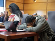 Lashay Gates, left, aunt of Layla Stewart, reads a victim impact statement as she joins her mom, Kristie Mays, grandmother of Layla Stewart, while Kirkland Warren is sentenced to life in prison for her death and the the deaths of her mom, Meshay Melendez, at the Clark County Courthouse on Tuesday afternoon, Oct. 8, 2024.