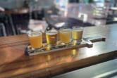 Trap Door Brewing offers a flight of four fresh-hop beers for $13.50.