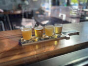 Trap Door Brewing offers a flight of four fresh-hop beers for $13.50.