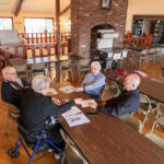 Vista Del Rio interim boardmembers Gloria Titus, clockwise from top, Tom Kent, Deb Swope and Rick Seekins hold a board meeting Tuesday. Residents are trying to buy the park, which has been put up for sale by the property owner. . (Taylor Balkom/The Columbian)