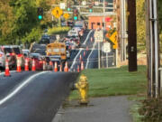 Traffic backs up onto Southeast 34th Street in Vancouver after a crash on state Highway 14 and the loss of a left-turn lane.