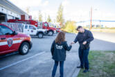 Firefighter-paramedic Connor Danielson hands car keys to mental health professional Janie Wadiak on Wednesday, while Danielson takes a call at Clark-Cowlitz Fire Rescue Station 21 in Ridgefield. The pair work as part of the Clark-Cowlitz Cares Team that can respond to community members experiencing crises.