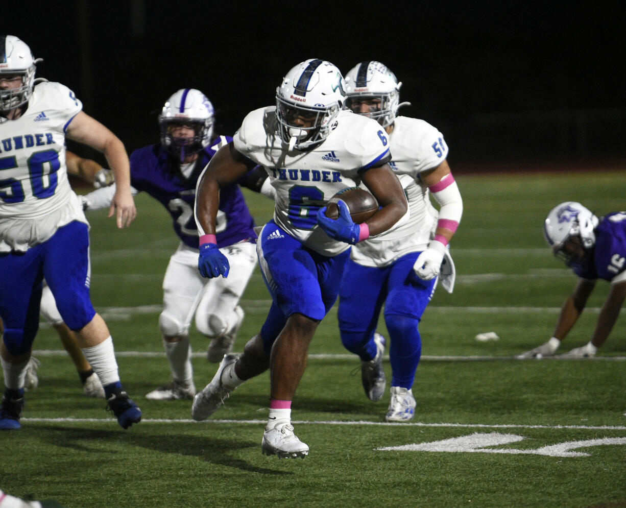 Jaden Brown of Mountain View runs downfield against Heritage during a 3A Greater St. Helens League football game at McKenzie Stadium on Thursday, Oct. 10, 2024.