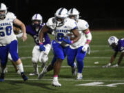 Jaden Brown of Mountain View runs downfield against Heritage during a 3A Greater St. Helens League football game at McKenzie Stadium on Thursday, Oct. 10, 2024.