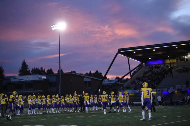 Columbia River players warm up prior to their 2A Greater St. Helens League football game against Hockinson at Columbia River High School on Friday, Oct. 11, 2024.