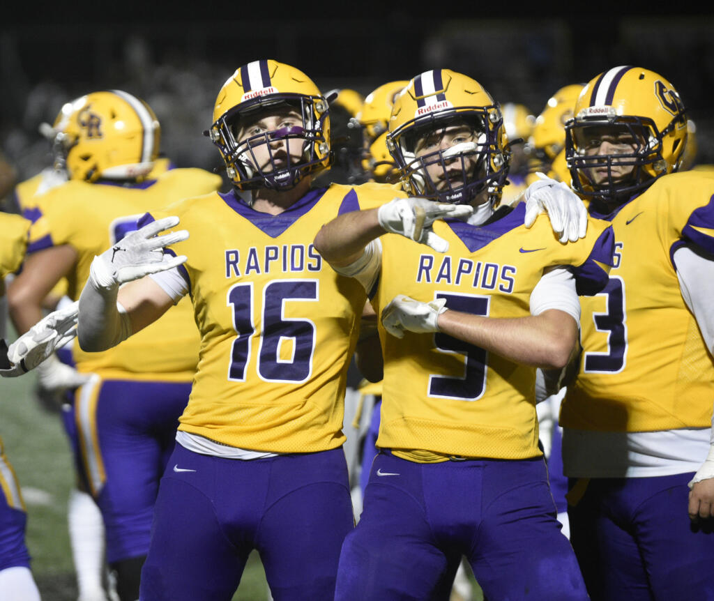 Preston Shearer (16) and Ethan Bumgarner (5) of Columbia River celebrate the Rapids' 24-14 win over Hockinsoin in a 2A Greater St. Helens League football game at Columbia River High School on Friday, Oct. 11, 2024.