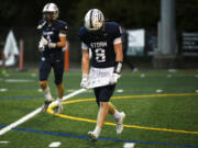 Gavin Packer (8) of Skyview displays his undershirt with the inscription "70 strong W.S." for his late teammate William Sloan. Packer scored the go-ahead touchdown as the Storm beat Richland 21-14 in a non-league football game at Kiggins Bowl on Saturday, Oct. 12, 2024.