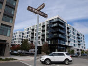 A motorist passes the Broadstone Claro apartments at the Waterfront Vancouver. Clark County was once known for being one of Washington&rsquo;s more affordable counties. Now, however, it is one of the most expensive places to live in the state.