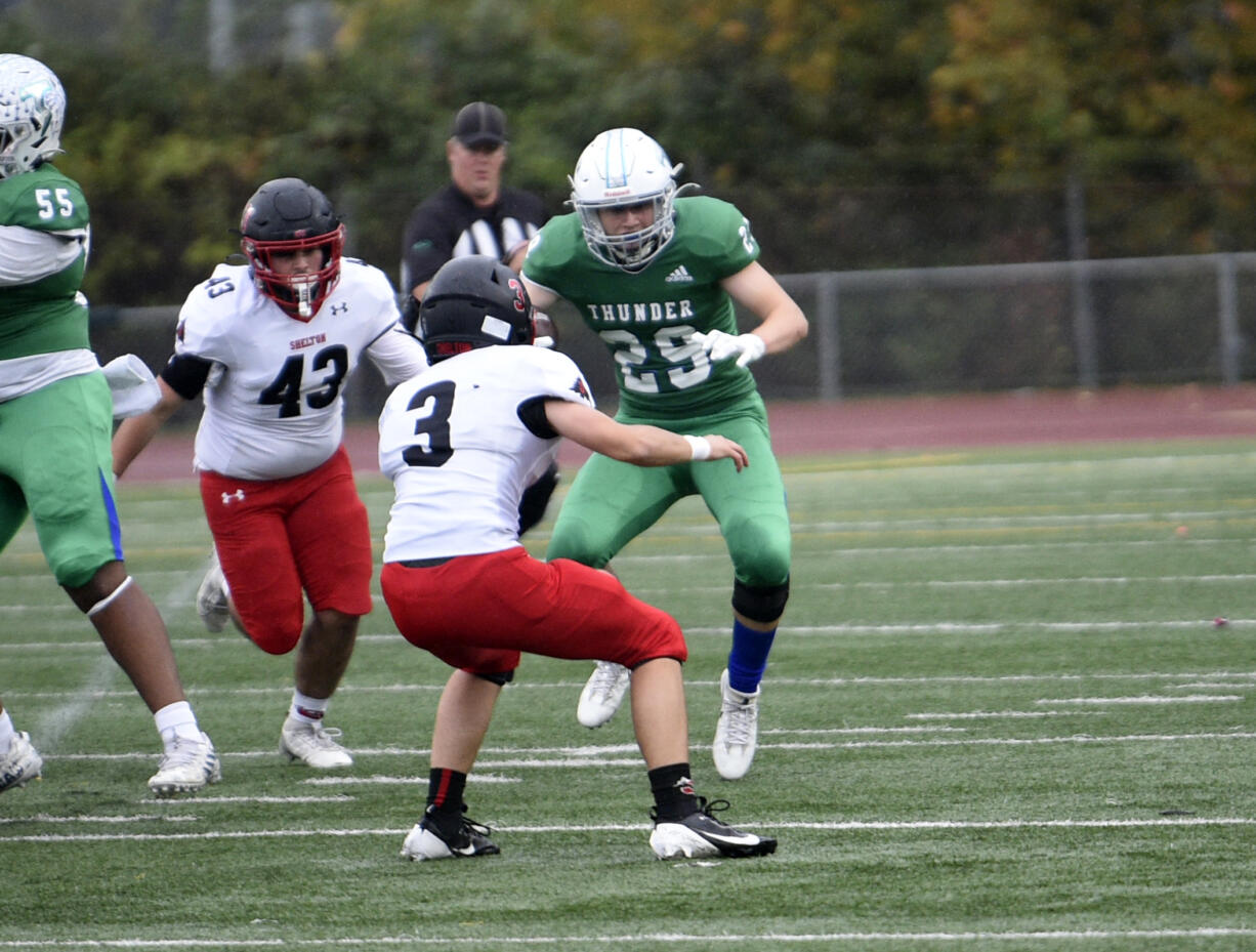 Dallas Hobbs (29) of Mountain View tries to avoid the tackle of Jensen Gunner (3) of Shelton duirng a 3A Greater St. Helens League football game at McKenzie Stadium on Friday, Oct. 18, 2024.