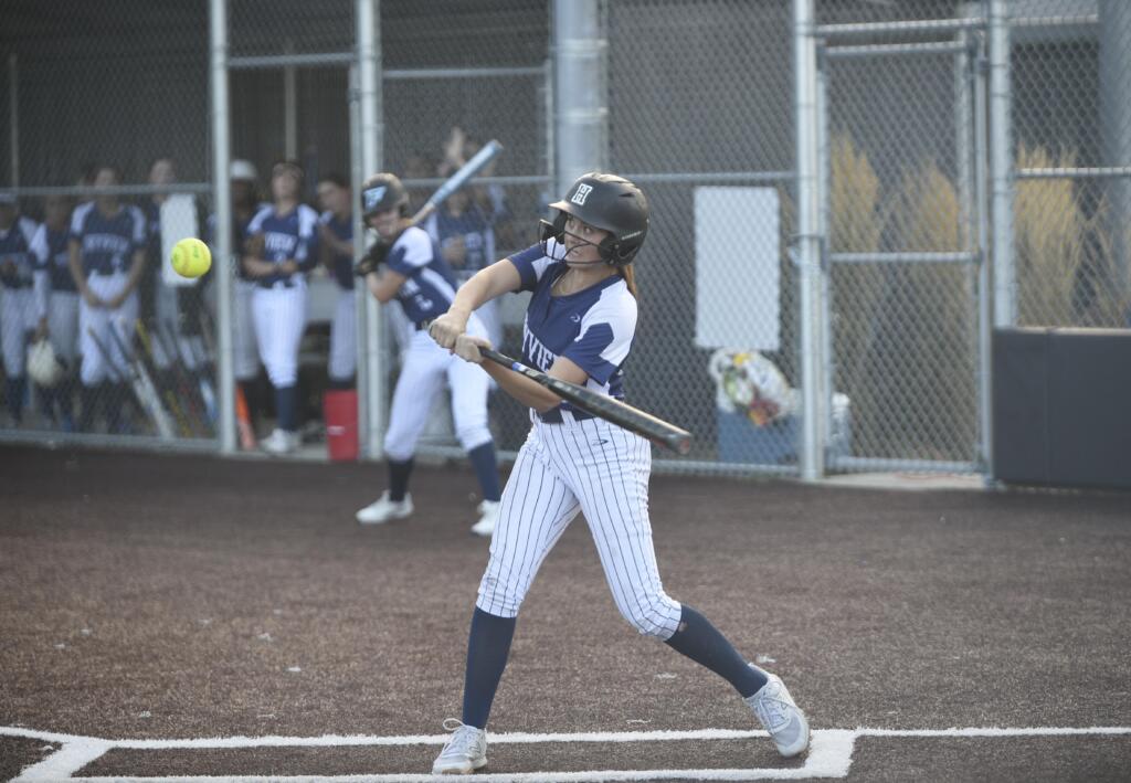 Skyview's Taylor Lies swings at a pitch for a base hit during the Class 4A district slowpitch softball championship against Union on Wednesday, Oct. 16, 2024, at Evergreen High School.