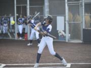 Skyview's Taylor Lies swings at a pitch for a base hit during the Class 4A district slowpitch softball championship against Union on Wednesday, Oct. 16, 2024, at Evergreen High School.