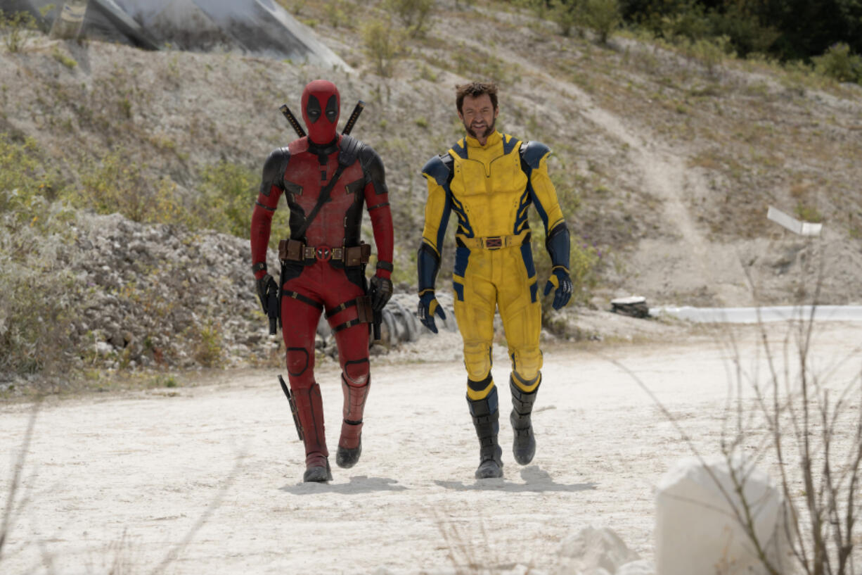 Ryan Reynolds, left, and Hugh Jackman in &ldquo;Deadpool &amp; Wolverine.&rdquo; (Jay Maidment/20th Century Studios and Marvel Studios/TNS)