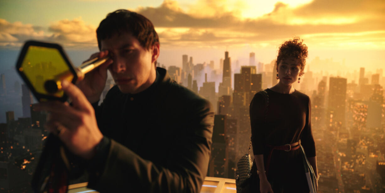 Adam Driver, left, and Nathalie Emmanuel in a scene from &ldquo;Megalopolis.&rdquo; (Lionsgate/TNS)