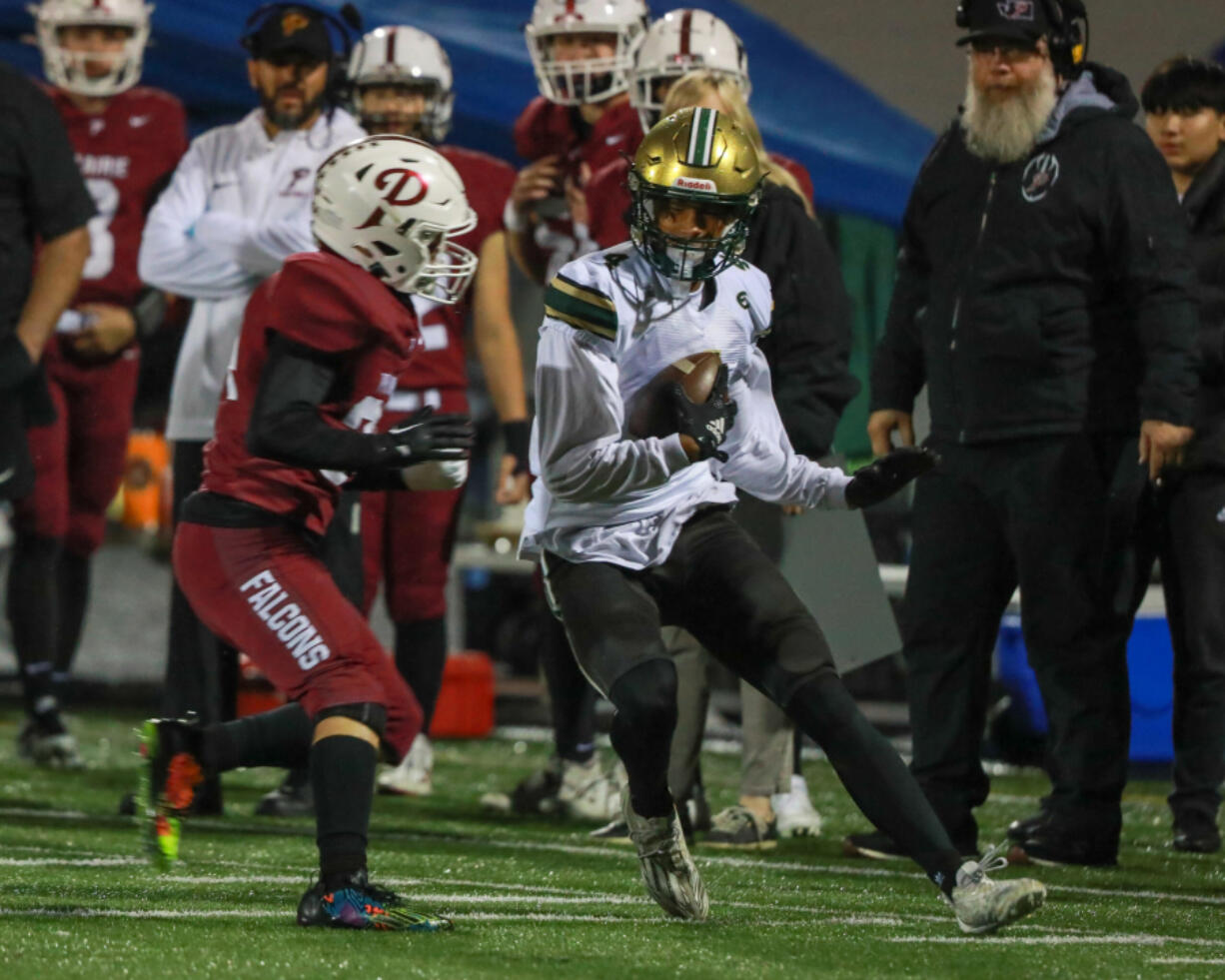 Ryder Keplar of Evergreen runs the ball against Prairie during a 3A Greater St. Helens League game Friday at District Stadium in Battle Ground.