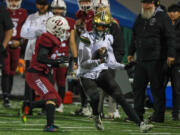 Ryder Keplar of Evergreen runs the ball against Prairie during a 3A Greater St. Helens League game Friday at District Stadium in Battle Ground.