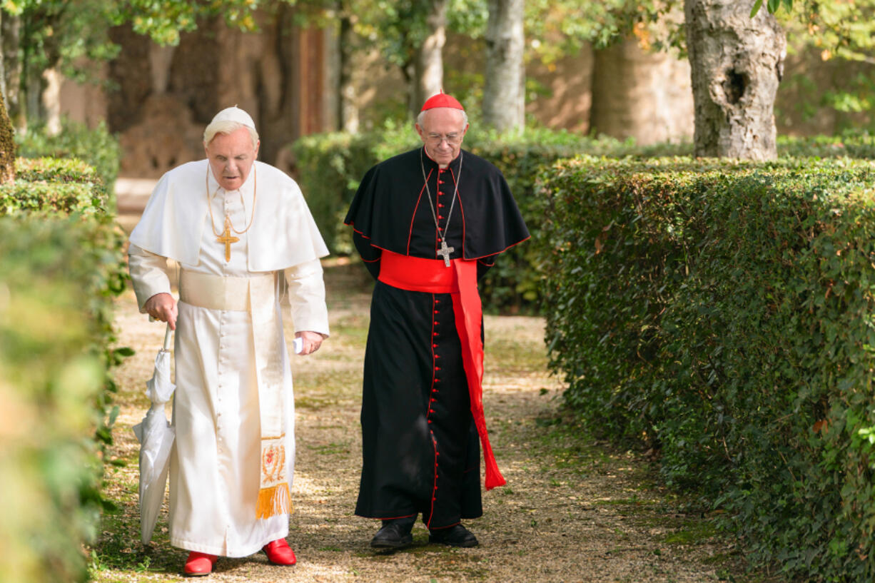 Anthony Hopkins, left, and Jonathan Pryce in &ldquo;The Two Popes.&rdquo; (Peter Mountain/Netflix)