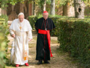 Anthony Hopkins, left, and Jonathan Pryce in &ldquo;The Two Popes.&rdquo; (Peter Mountain/Netflix)