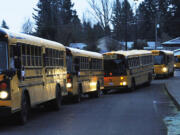 Washougal school buses wait to collect students in 2018.