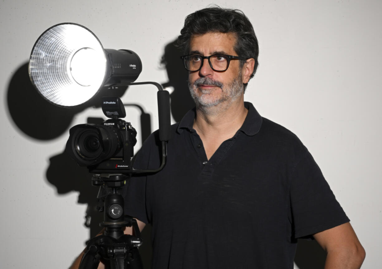 Alec Soth stands for a portrait with his digital medium format camera in his studio Sept. 26, in St. Paul, Minn.