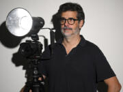 Alec Soth stands for a portrait with his digital medium format camera in his studio Sept. 26, in St. Paul, Minn.