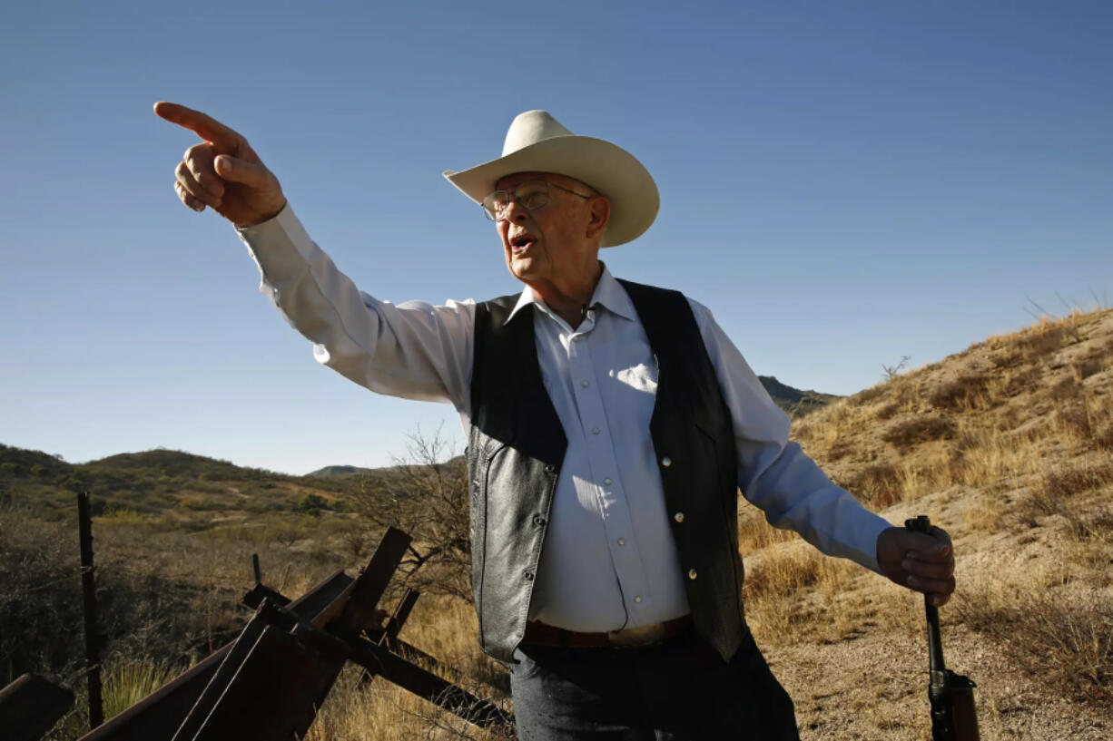 At the border west of Nogales, Ariz., rancher Jim Chilton points to the dirt roads that Mexican traffickers use to transport drugs right to the U.S. boundary.