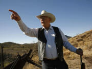 At the border west of Nogales, Ariz., rancher Jim Chilton points to the dirt roads that Mexican traffickers use to transport drugs right to the U.S. boundary.